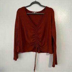 Rust Orange size large sweater with adjustable cinch